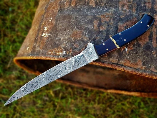 Damascus fillet knife with buffalo horn and rosewood handle and leather sheath