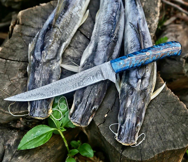 Damascus fillet knife with patterned pine cone handle and leather sheath