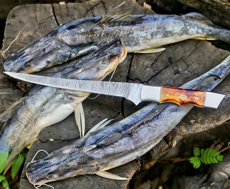 Damascus fillet knife with camel bone handle, steel bolster and leather sheath