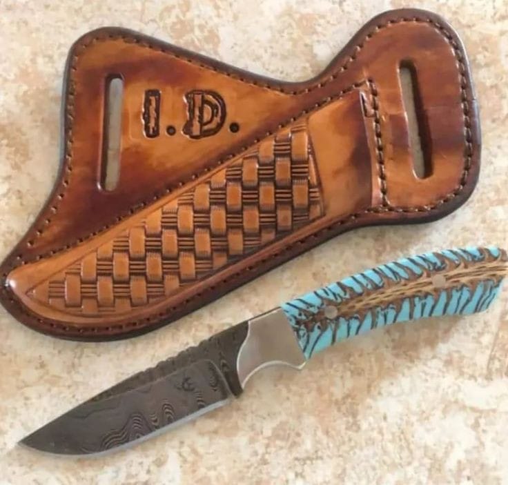 Damascus belt knife with pine cone resin handle, steel bolster and leather sheath