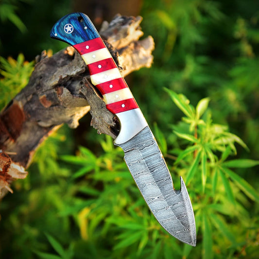 Damascus skinning knife with American flag themed handle