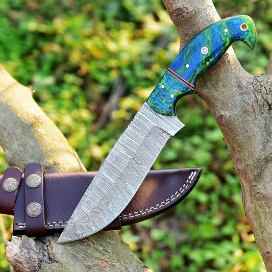 Damascus skinning knife with a weather-resistant resin handle