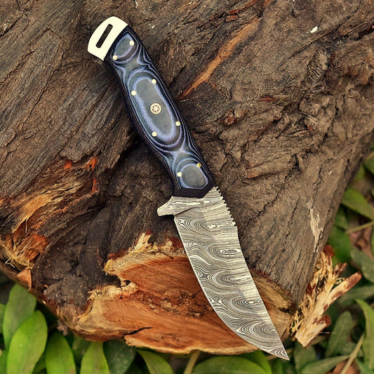 Damascus steel skinning knife with layered sheet handle