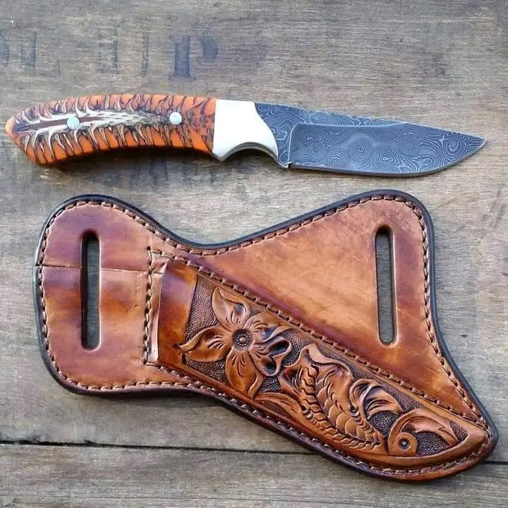 Rasp steel belt knife with clear resin pine cone handle and Western leather sheath