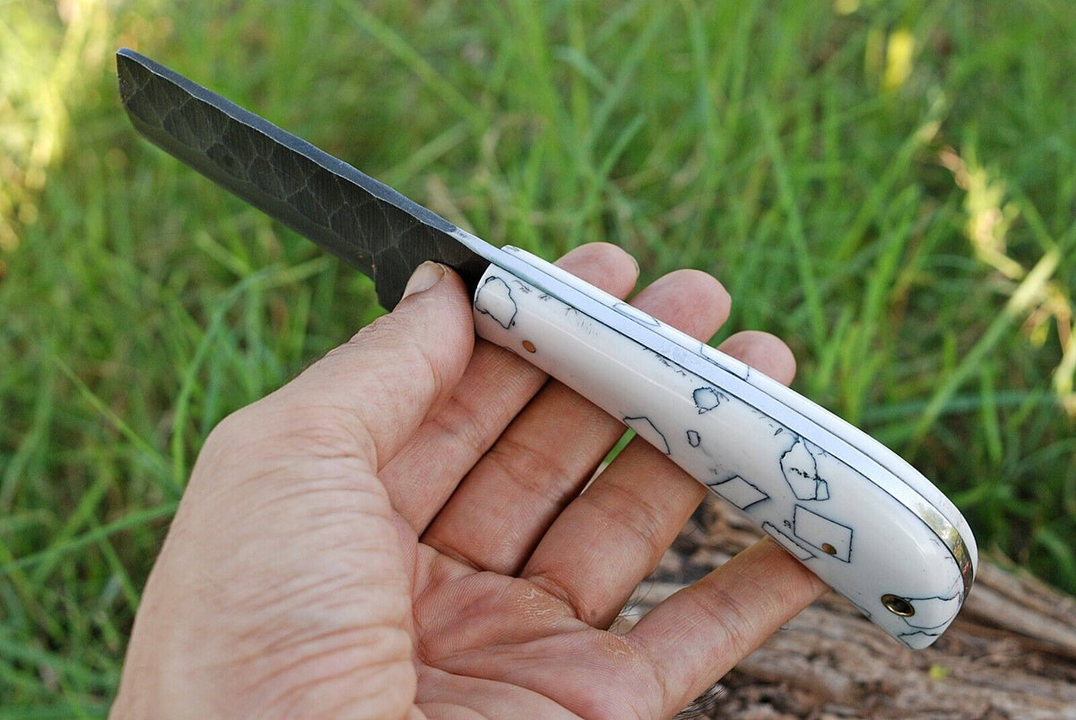 Bull cutter knife with a J2 steel blade and resin handle