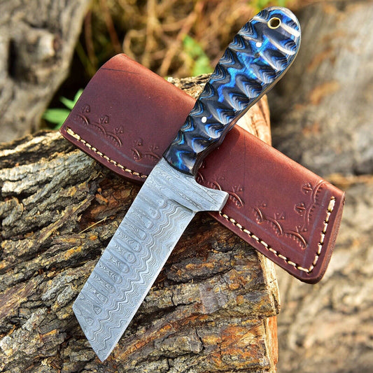 Damascus bull cutter knife with a pakkawood handle and leather sheath