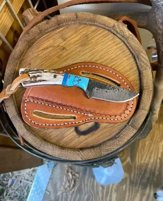 J2 steel cowboy belt knife with stag horn handle and belt holster