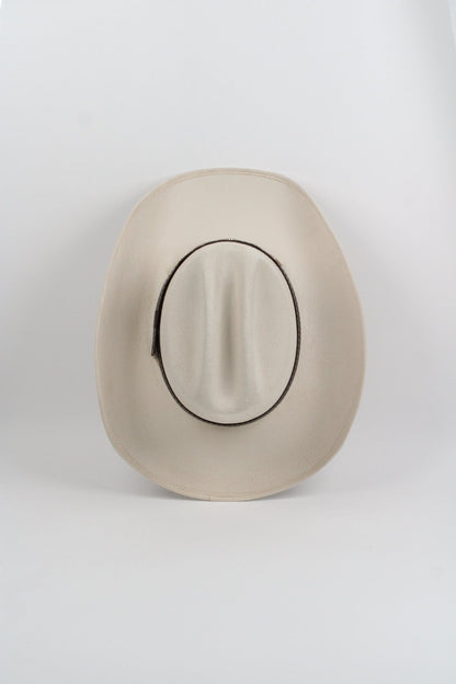 Ivory vegan suede cowboy hat with a lifted brim and faux leather band, view 4