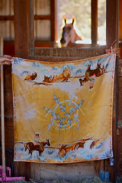 Yellow and sage silk wild rag with a cowgirl, a longhorn and a red stitched-look border, view 3