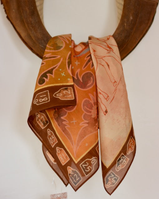 Rust and pink wild rag showing a cowgirl roping calves for branding, view 4