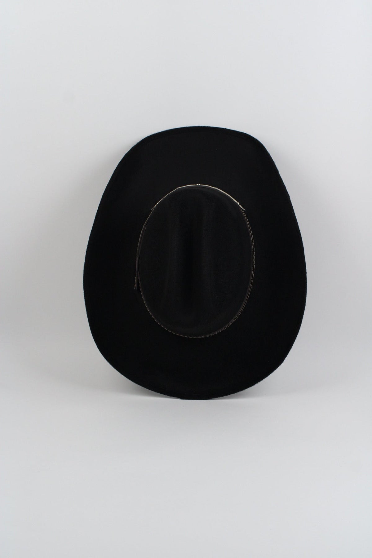 Black vegan suede cowboy hat with a lifted brim and faux leather band, view 4