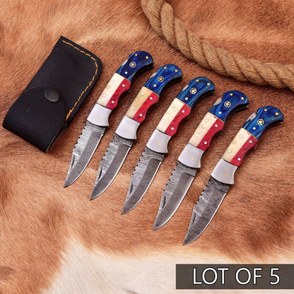 Damascus pocket knife with bold Texas flag handle and stitched leather sheath