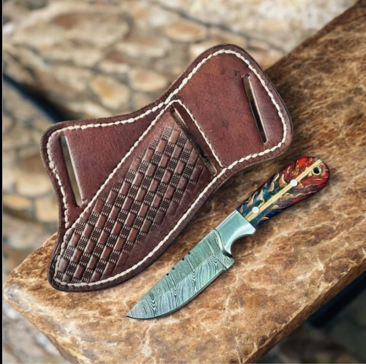 Damascus fixed blade knife with pine cone resin handle and handmade leather sheath
