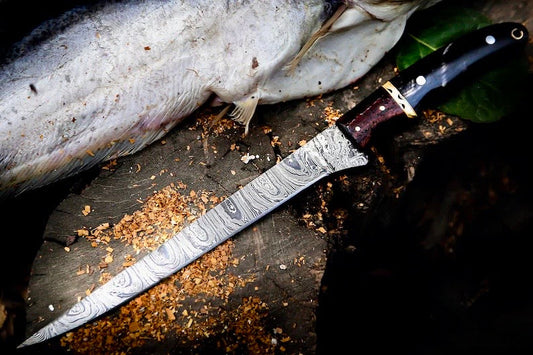 Damascus fillet knife with buffalo horn and rosewood handle, brass spacers and leather sheath