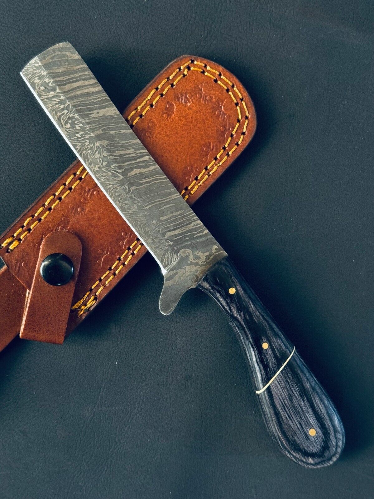 Damascus calf cutter knife with pakkawood handle, brass guard and leather sheath