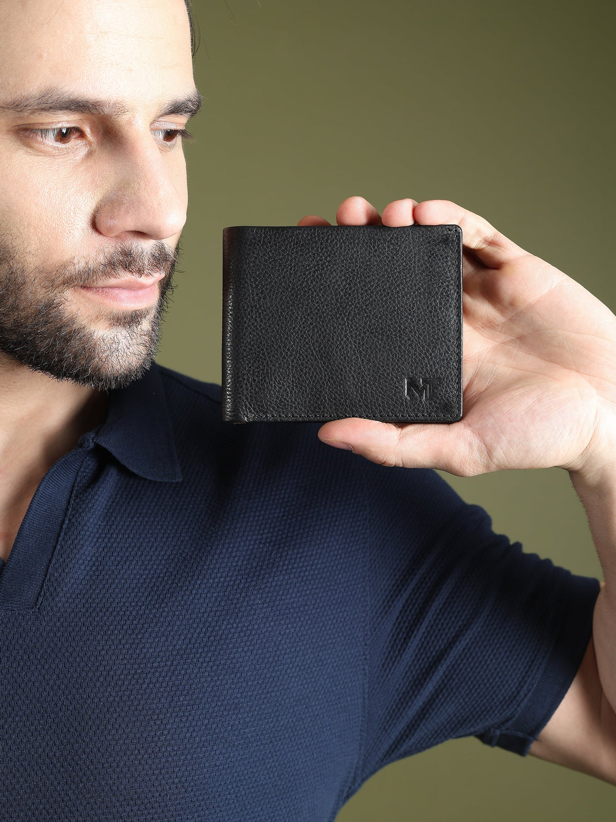 Black leather card wallet open to show yellow leather interior, view 4