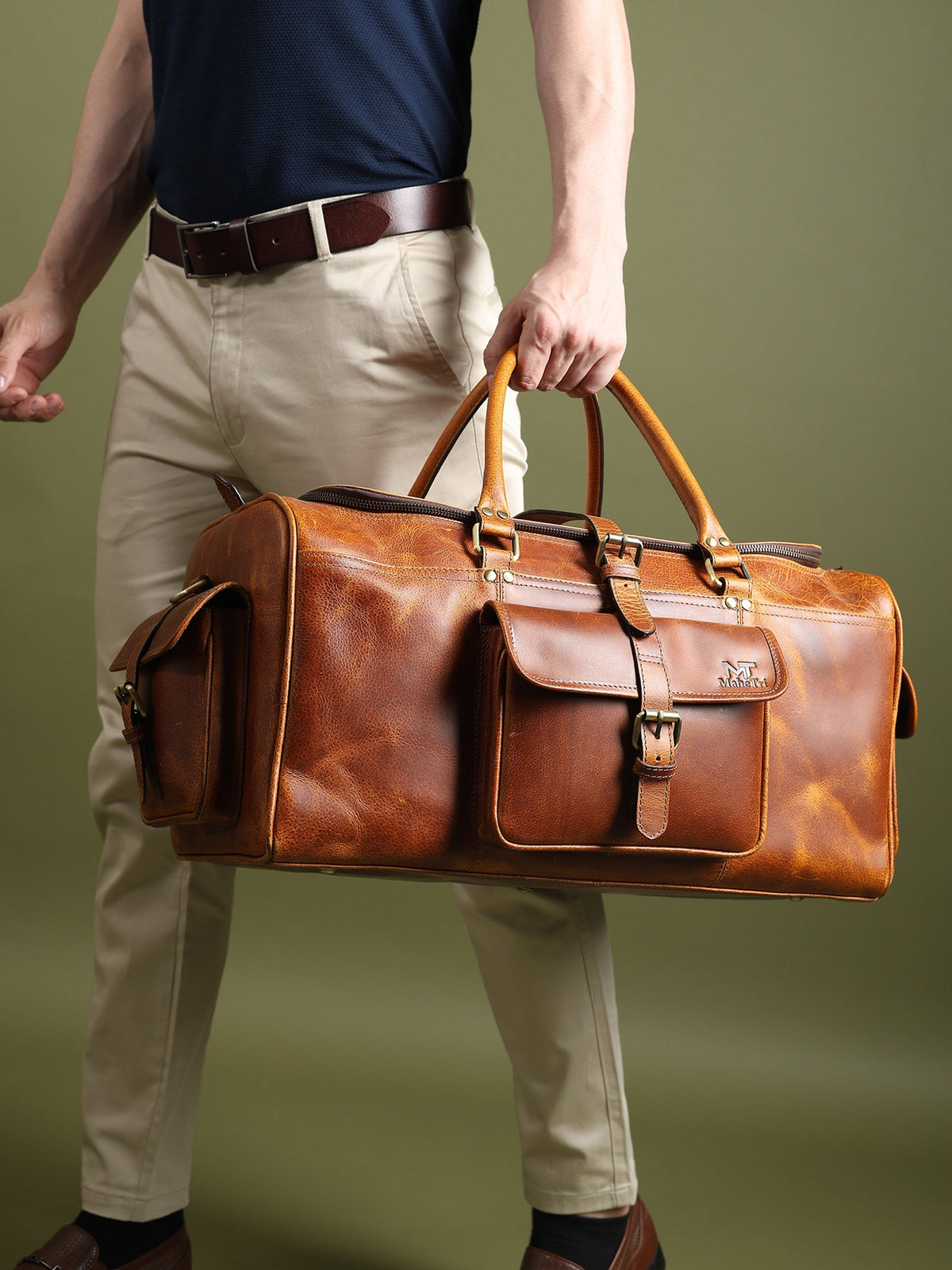Full-grain leather weekender duffle with brass hardware and shoulder strap, view 2