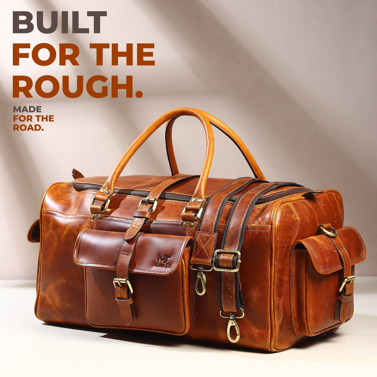 Full-grain leather weekender duffle with brass hardware and shoulder strap, view 3