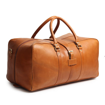 Tan buffalo leather duffle bag with brass hardware and shoulder strap, view 4