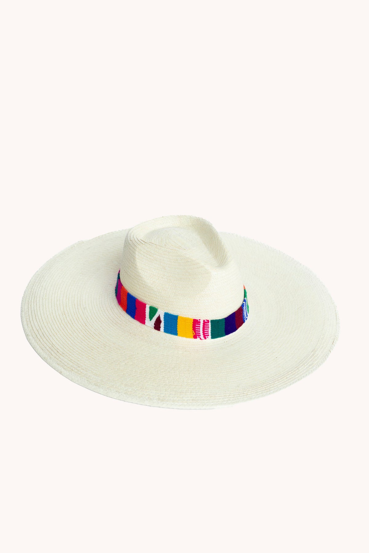 White palm leaf straw Western hat with a wide brim and woven band