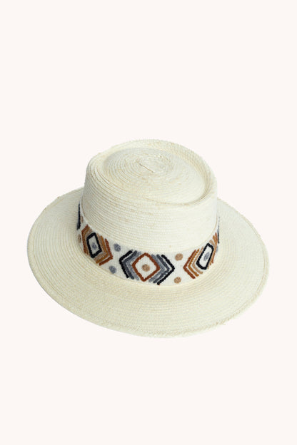 White palm leaf straw bucket hat with a woven textile band