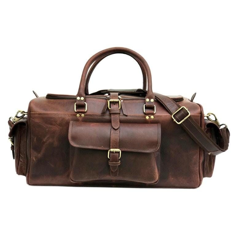 Dark brown leather duffle bag with shoulder strap and buckled pockets