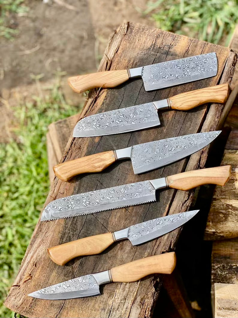 Damascus steel chef knife with olivewood handle, steel bolster and leather sheath