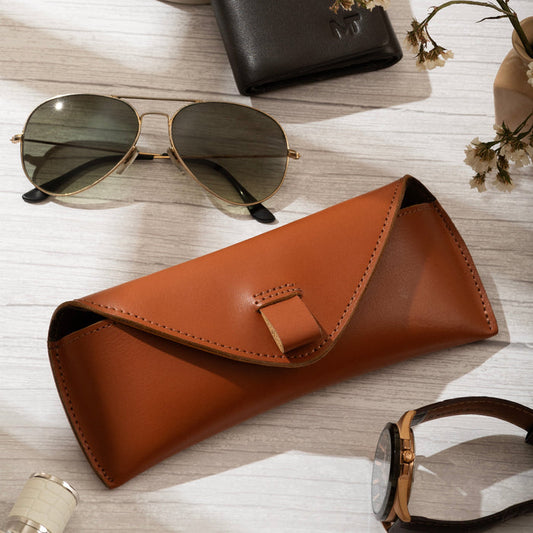 Leather sunglasses case with push-button closure