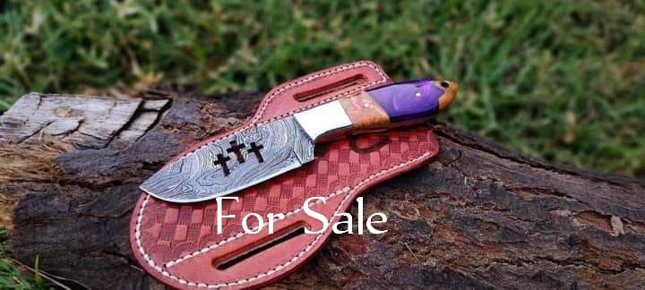Cowboy belt knife with resin and olivewood handle, steel bolster and leather sheath