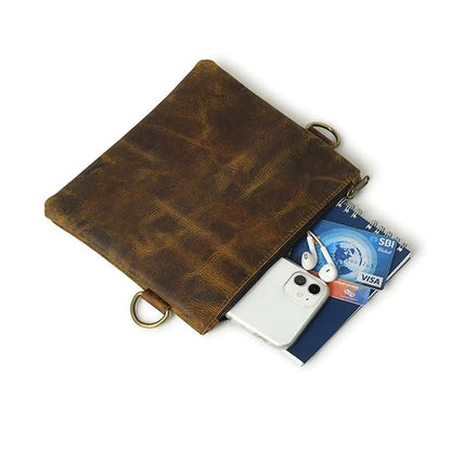 Buffalo leather crossbody sling bag with brass hardware and adjustable strap, view 3