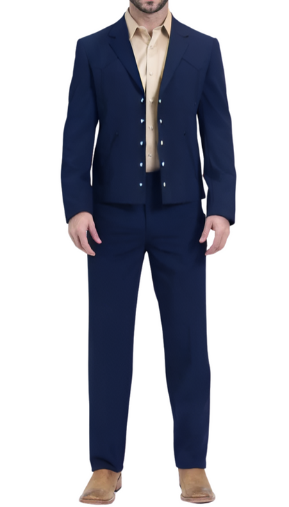 Man in a navy two-piece Western suit with pearl snaps, a tan shirt and brown boots