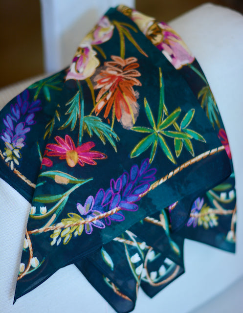 Near-black wild rag with jewel-tone wildflowers, purple lupine and a rope border, view 2