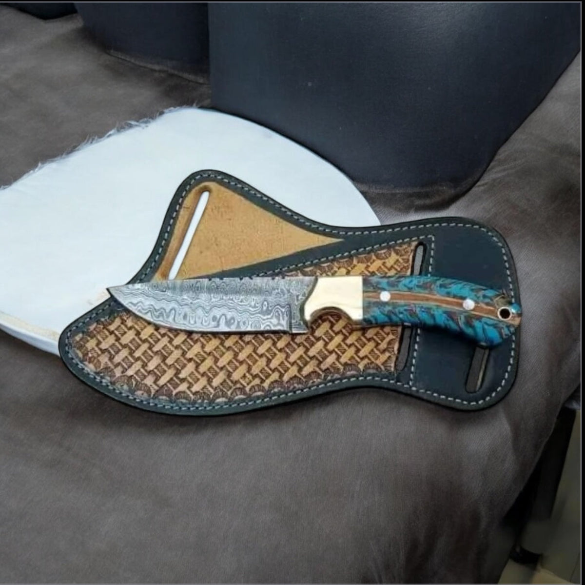 Damascus cowboy belt knife with pine cone resin handle and brass bolster