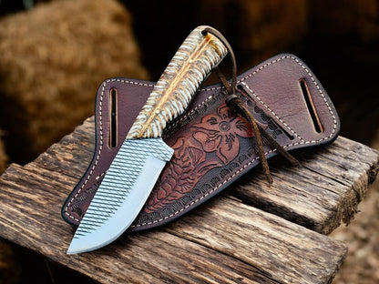 Handmade ranch knife with rasp steel blade and white pine cone resin handle