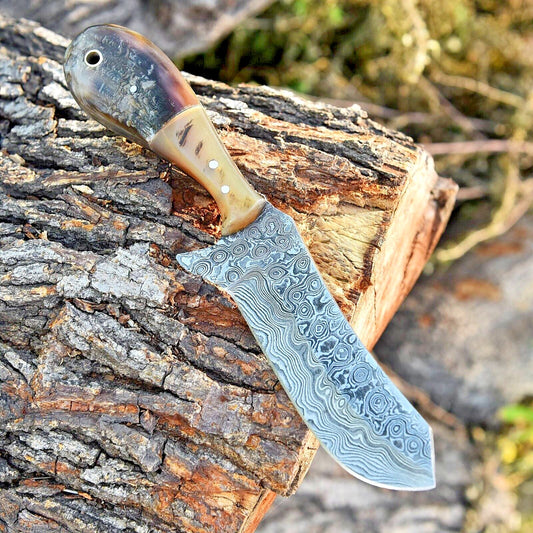 Damascus belt knife with a sheep horn handle and leather sheath