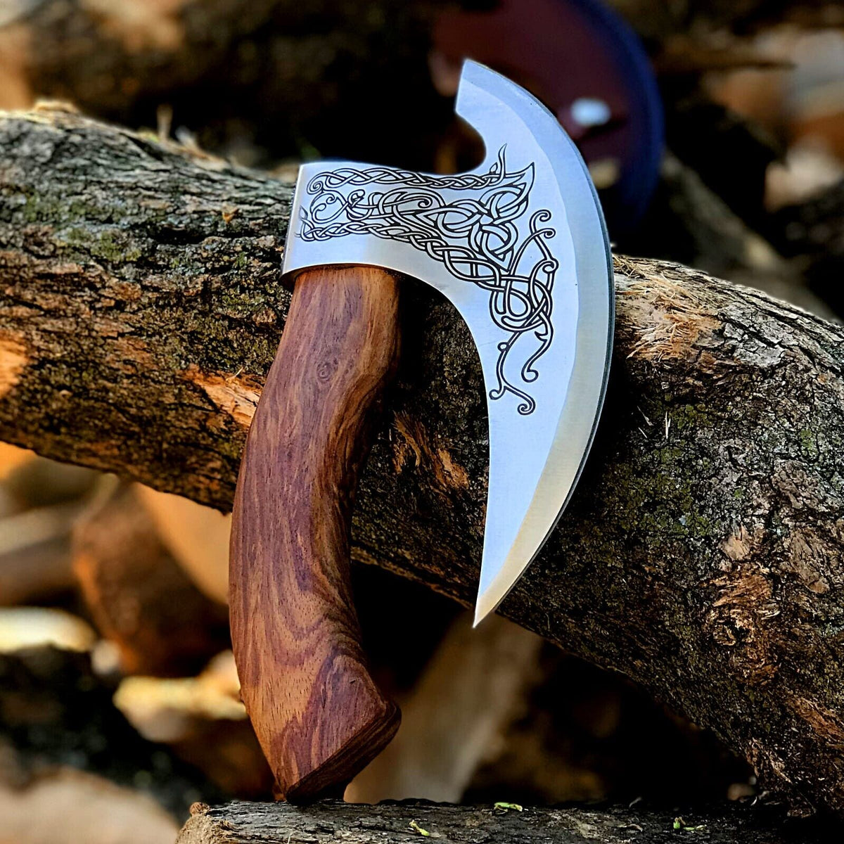Hand-engraved axe-shaped pizza cutter with wood handle and leather sheath