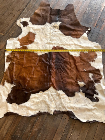 The Brazilian Cowhide Rug, 6.5 × 4.5 ft | Cowhide and Conchos