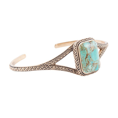 Golden bronze open cuff bracelet with a rectangular blue-green turquoise stone