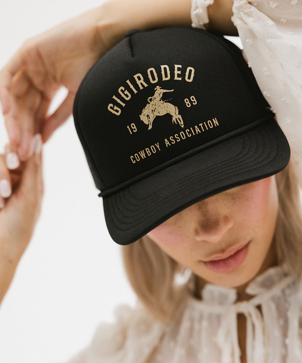 Black foam and mesh trucker hat with a hand-drawn cowboy and bucking bronco, view 2