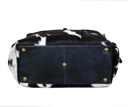 Black and white hair-on cowhide duffel bag with shoulder strap, view 3
