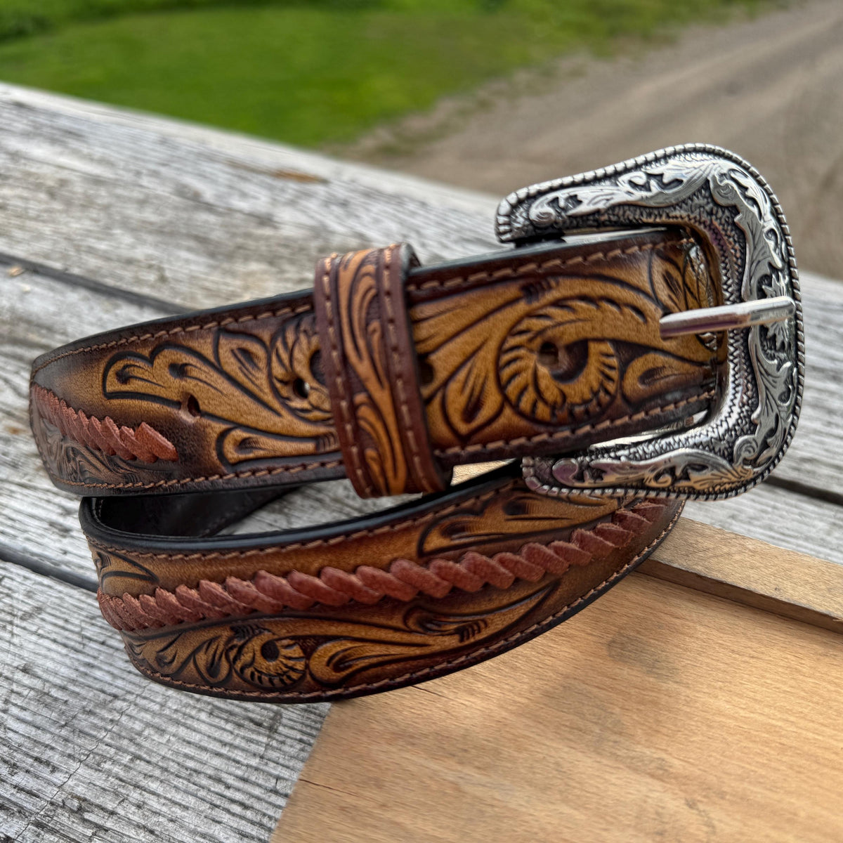 Hand-tooled leather Western belt with antique silver buckle by Double B