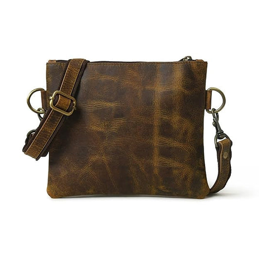 Buffalo leather crossbody sling bag with brass hardware and adjustable strap