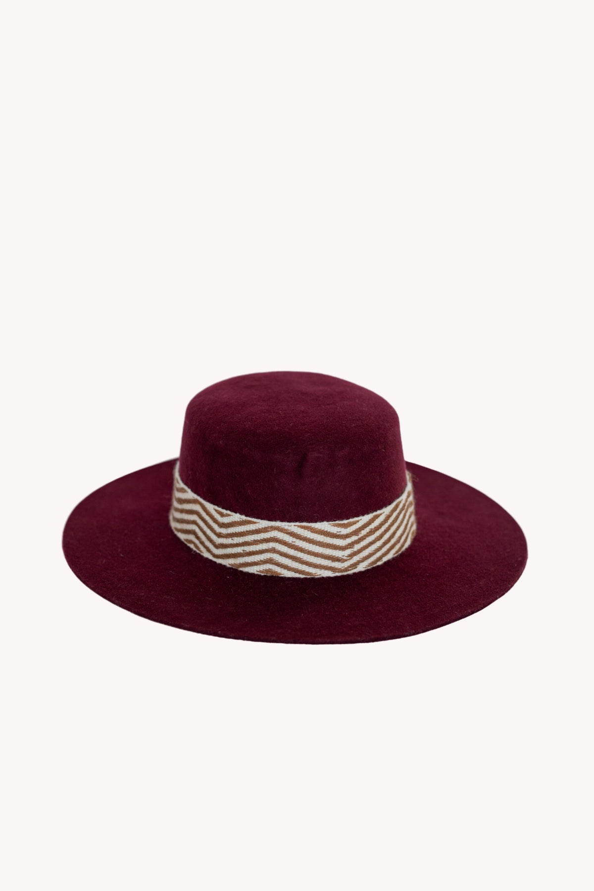 Maroon alpaca wool felt Spanish style hat with a woven textile band