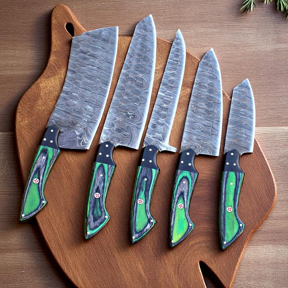 Five-piece Damascus knife set with black and parrot wood handles