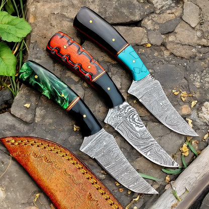 Damascus hunting knife with resin and exotic wood handle, view 3
