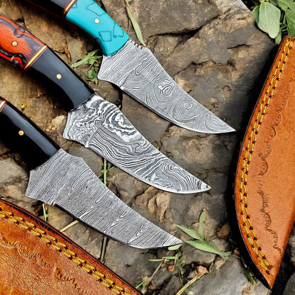 Damascus hunting knife with resin and exotic wood handle, view 4