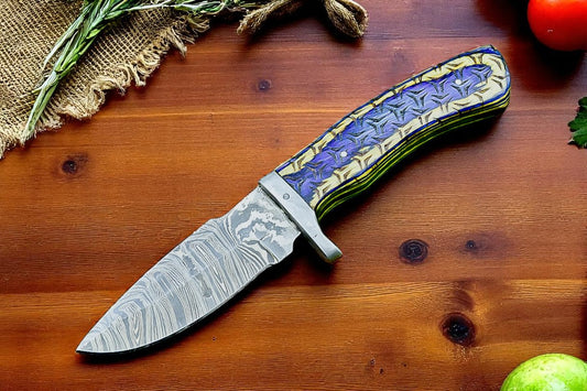 Damascus hunting knife with wood handle and steel bolster